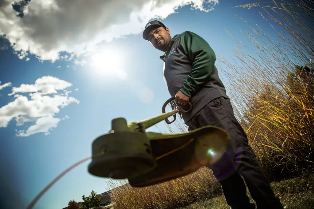 man using landscaping equipment