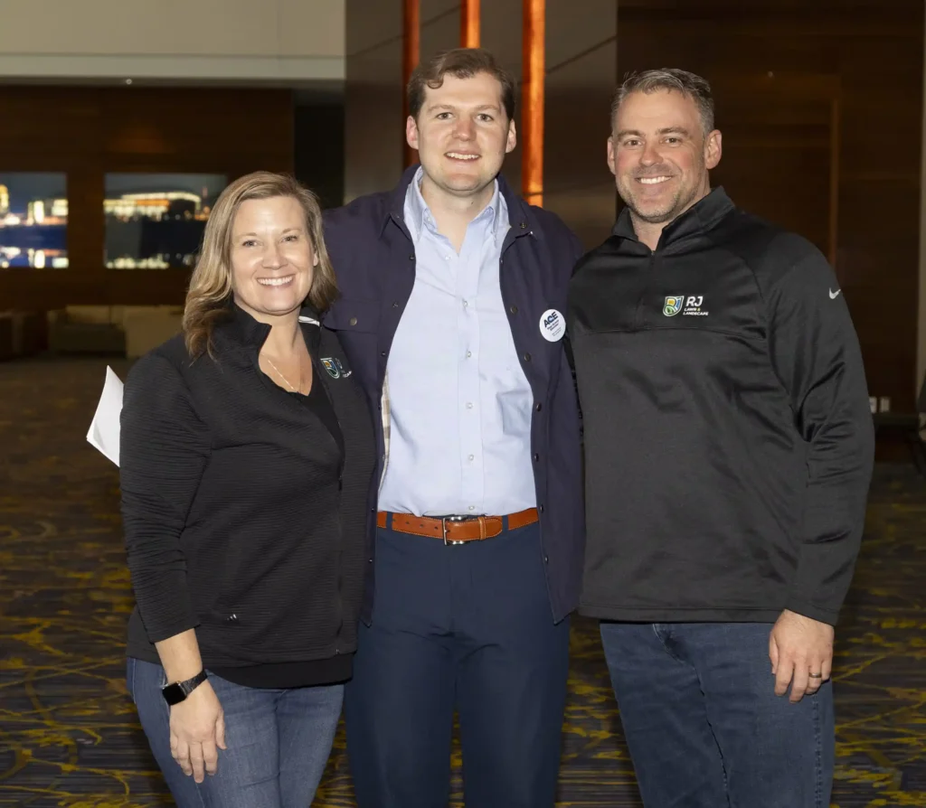 members of the RJ Landscaping team smiling